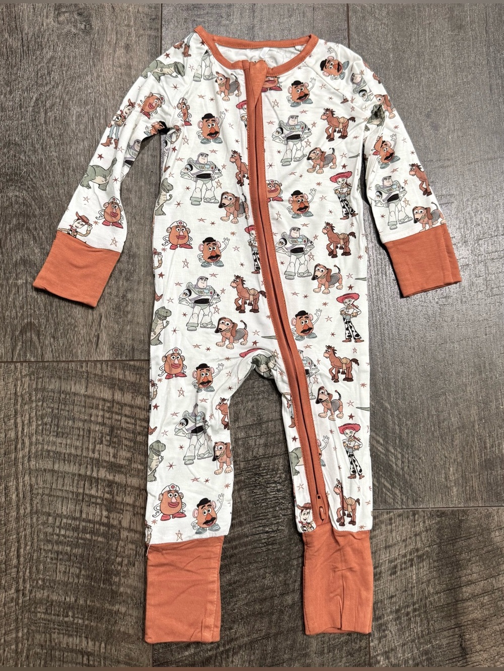 Little Sleepies White Pajamas with Rust Trim and Toy Story Character Print